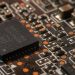 Detailed close-up of a computer circuit board showcasing electronic components.