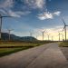 Scenic view of wind turbines in Vietnam countryside during sunset. Clean energy and sustainable landscape.