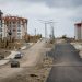 A modern urban residential area under development in Palu, Elazığ, featuring newly constructed buildings and roads.