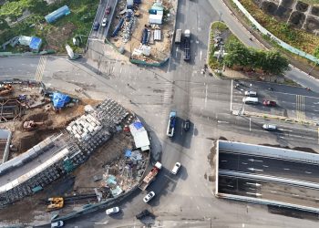 High angle shot of road construction and traffic in Ho Chi Minh City.