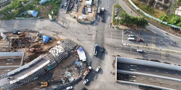 High angle shot of road construction and traffic in Ho Chi Minh City.