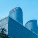 Low angle view of Hangzhou Century Center skyscrapers against a clear sky.