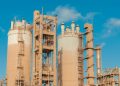 A view of urea towers at an industrial plant in Libya, captured on a clear day.