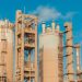 A view of urea towers at an industrial plant in Libya, captured on a clear day.
