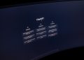 Close-up of a computer screen displaying ChatGPT interface in a dark setting.