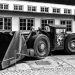 Black and white photo of historical mining machinery at Rammelsberg Museum in Goslar, Germany.