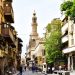 Explore the charm of a bustling historic street in Cairo with stunning architecture and cultural vibrancy.