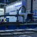 A view of advanced industrial machinery displayed at a trade fair exhibit.