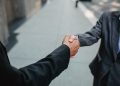 International business cooperation handshake trade partnership conference