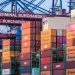 Container stacks and cranes at Terminal Burchardkai in Hamburg, Germany port.
