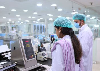 Scientists conducting tests in a pharmaceutical lab in Islamabad, Pakistan.