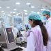 Scientists conducting tests in a pharmaceutical lab in Islamabad, Pakistan.