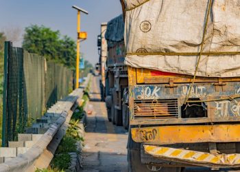 Close-up of an Indian truck on Deeg highway, showcasing vibrant colors and unique designs.