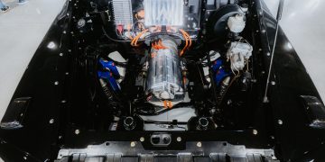Top view of a modern electric car engine showcasing technical components and design.